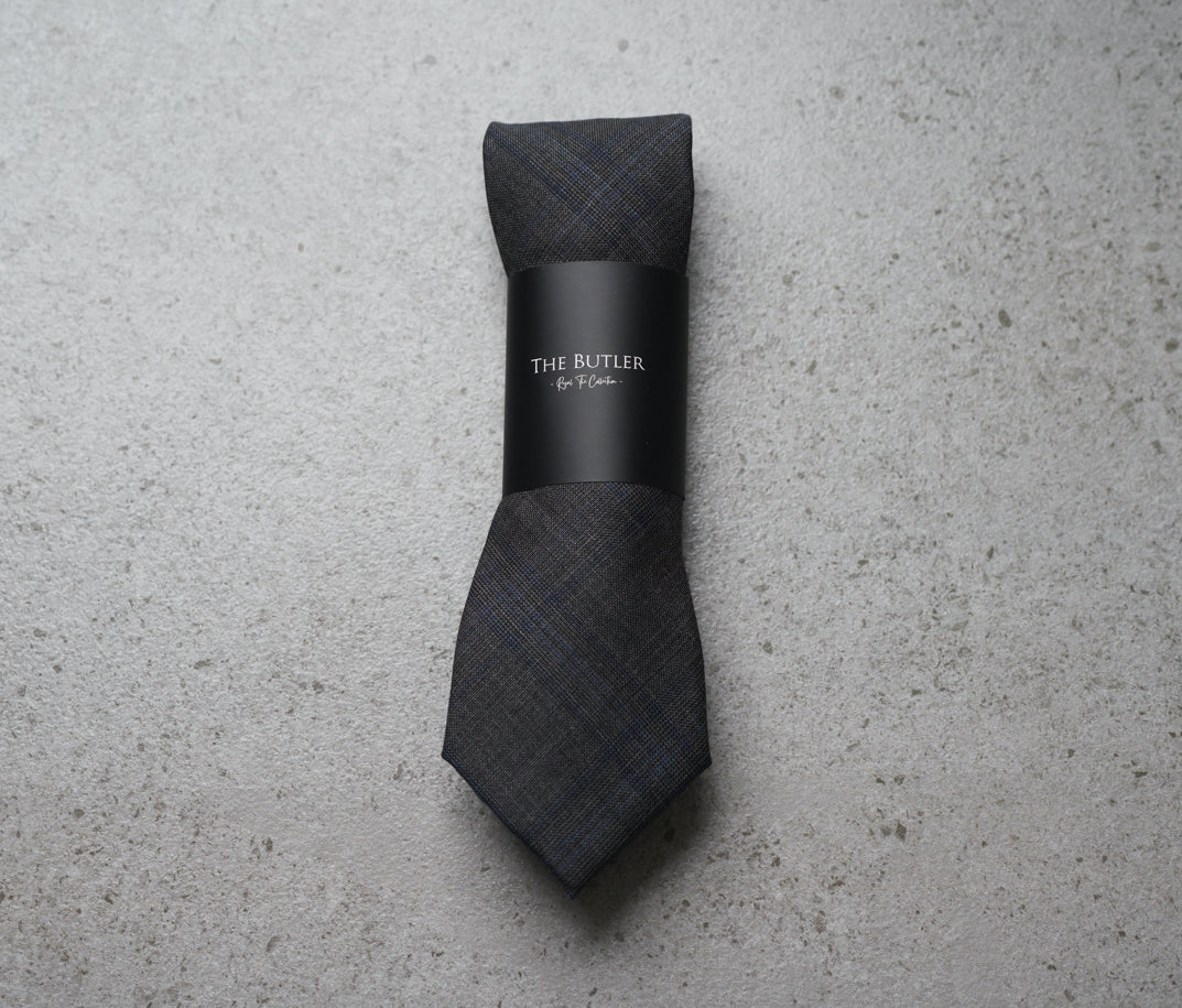 The Butler Sri Lanka Alphonse Formal Necktie - Charcoal Grey Wool-Blend with Dark Blue Plaid Pattern