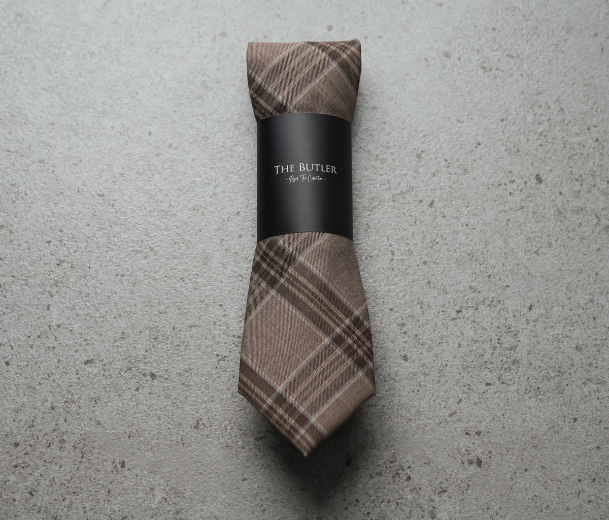 The Butler Sri Lanka Lysanthir Formal Necktie - Beige and Brown Wool-Blend Plaid with Light Blue Accent