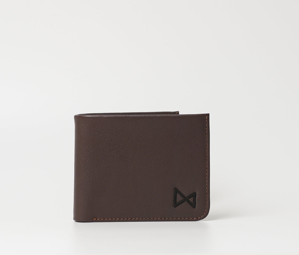 Chadwick Coffee Brown wallet with a matte coffee exterior, black interior, 6 card slots, and 2 cash compartments. Available at The Butler