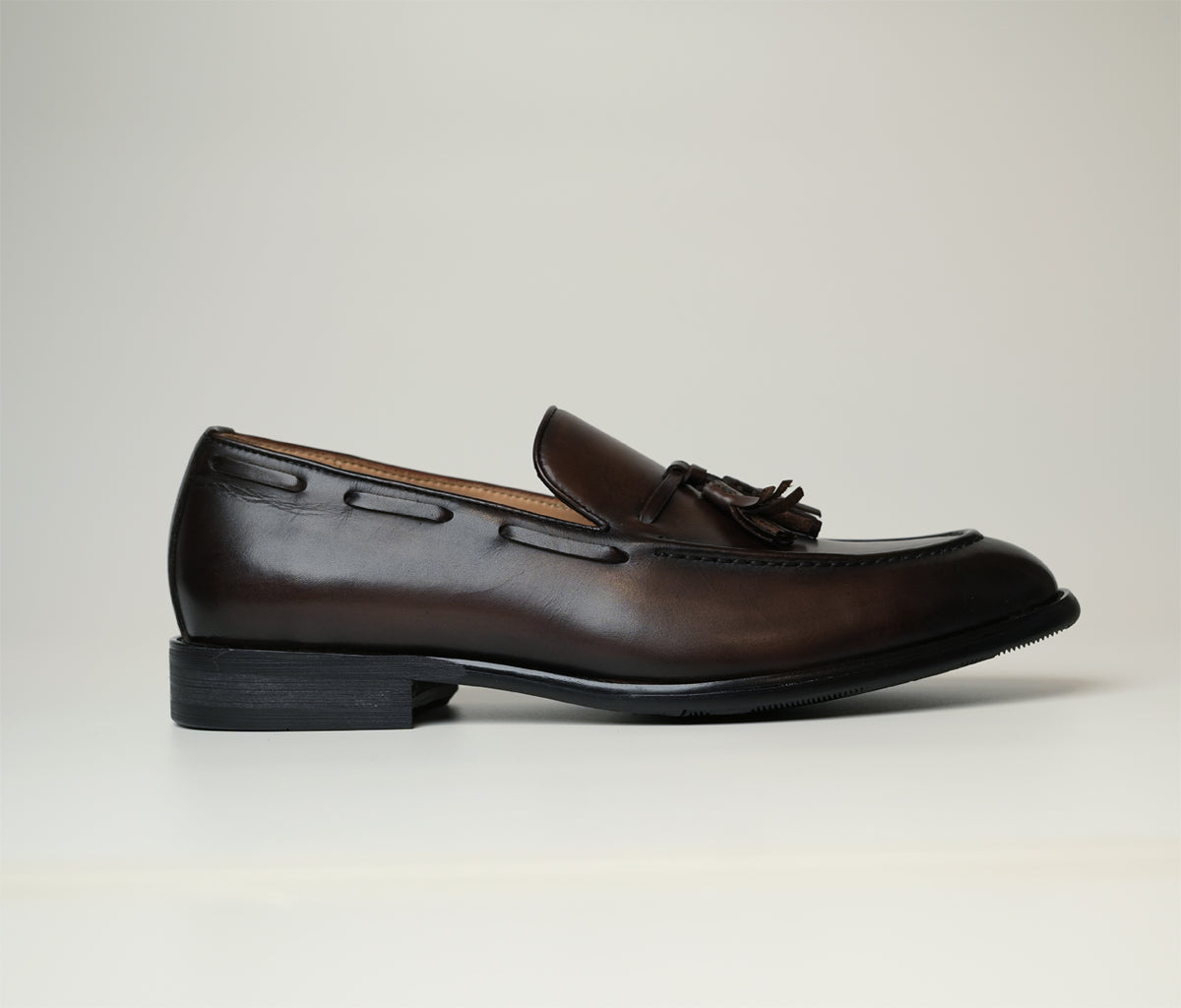 Milano Brown Tassel Loafer is a hand-tanned full-grain leather loafer in tan brown with elegant accents and stitching, available at The Butler Sri Lanka