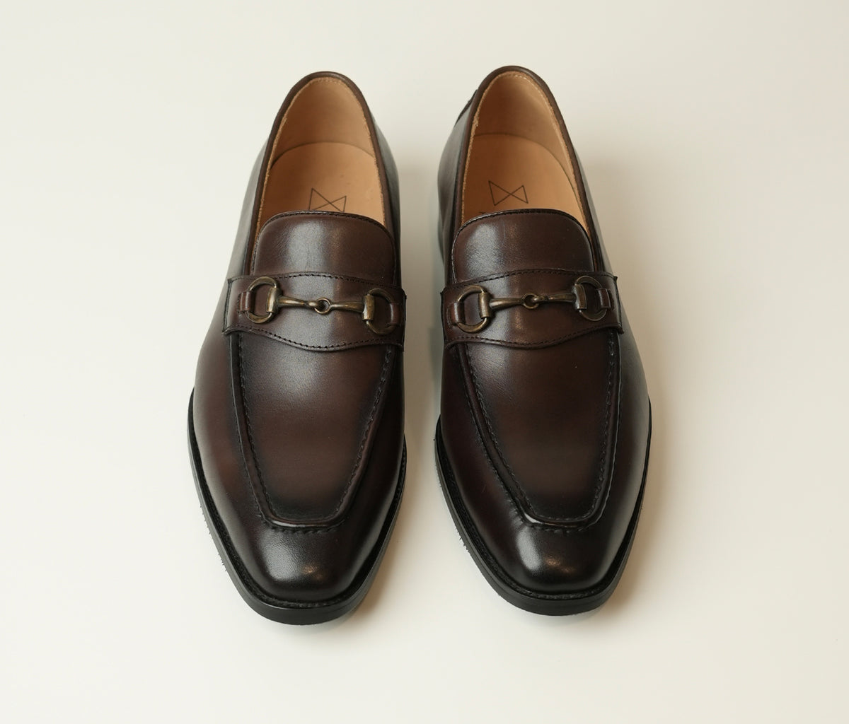 Roma is a luxury tan brown horsebit buckle loafer made from full-grain leather, ideal for formal and casual occasions, available at The Butler Sri Lanka.