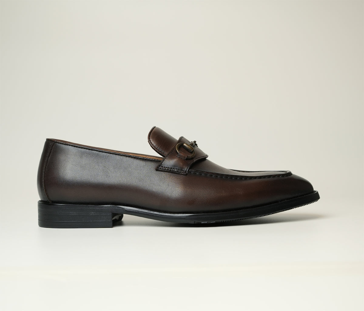 Roma is a luxury tan brown horsebit buckle loafer made from full-grain leather, ideal for formal and casual occasions, available at The Butler Sri Lanka.