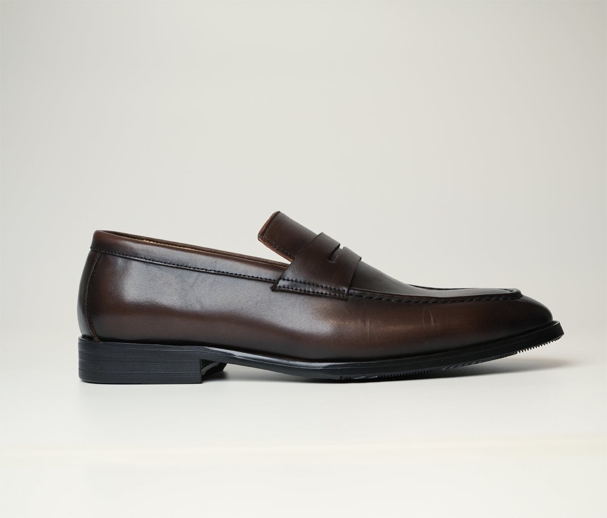 Tuscan is a sleek brown formal casual loafer made from full-grain leather, combining Italian style with versatility, available at The Butler Sri Lanka.